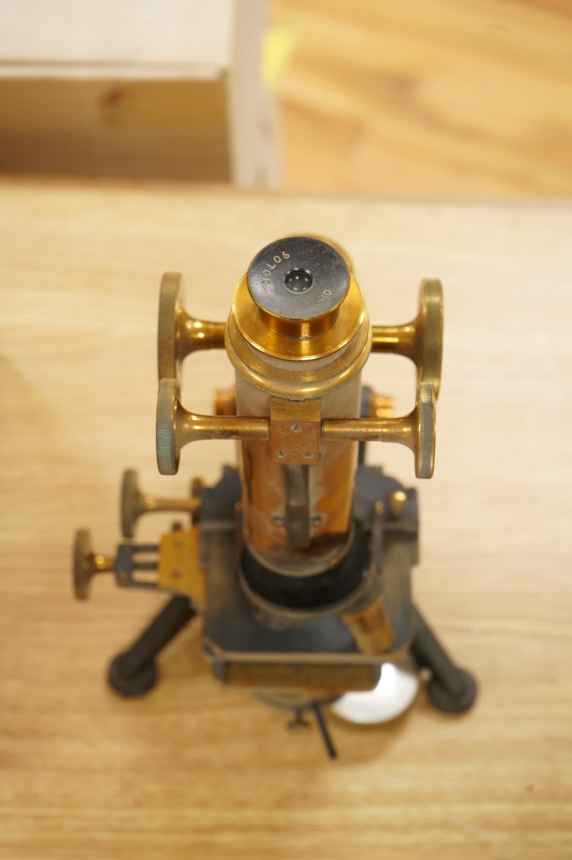 A early 20th century brass compound monocular microscope, by W. Watson and Sons, 313, High Holborn, London, number 9385, mahogany cased, with accessories including - four additional objectives, two eyepieces and a bull’s